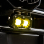 Baja Designs S2 SAE amber LED light pods installed on vehicle