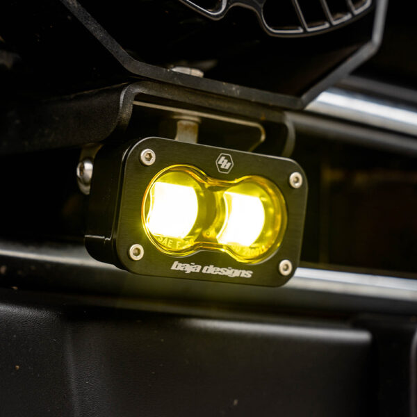 Baja Designs S2 SAE amber LED light pods installed on vehicle