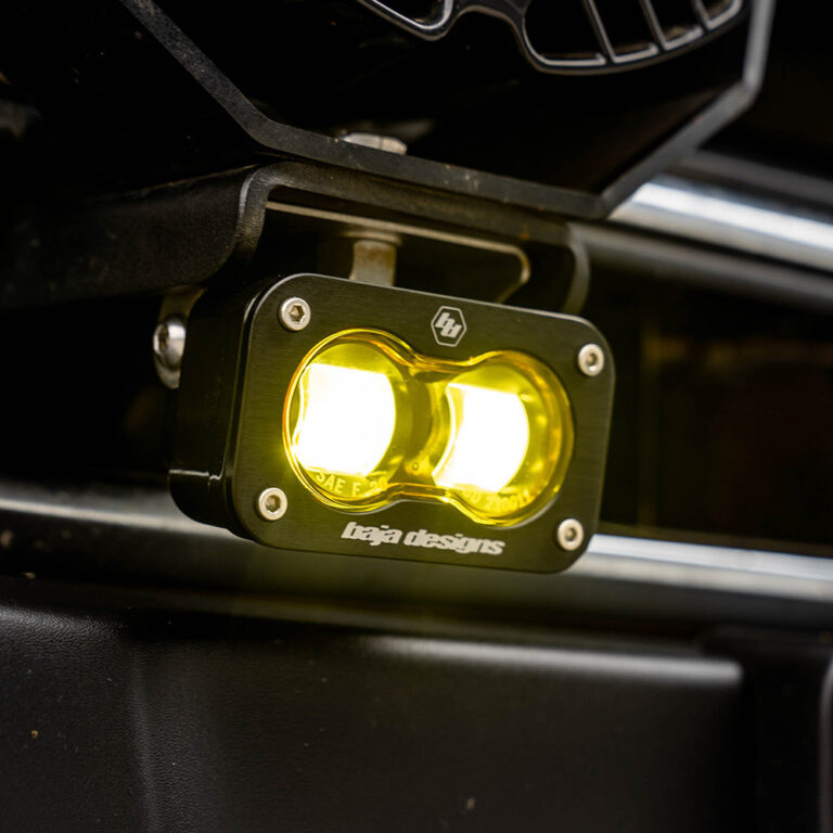Baja Designs S2 SAE amber LED light pods installed on vehicle